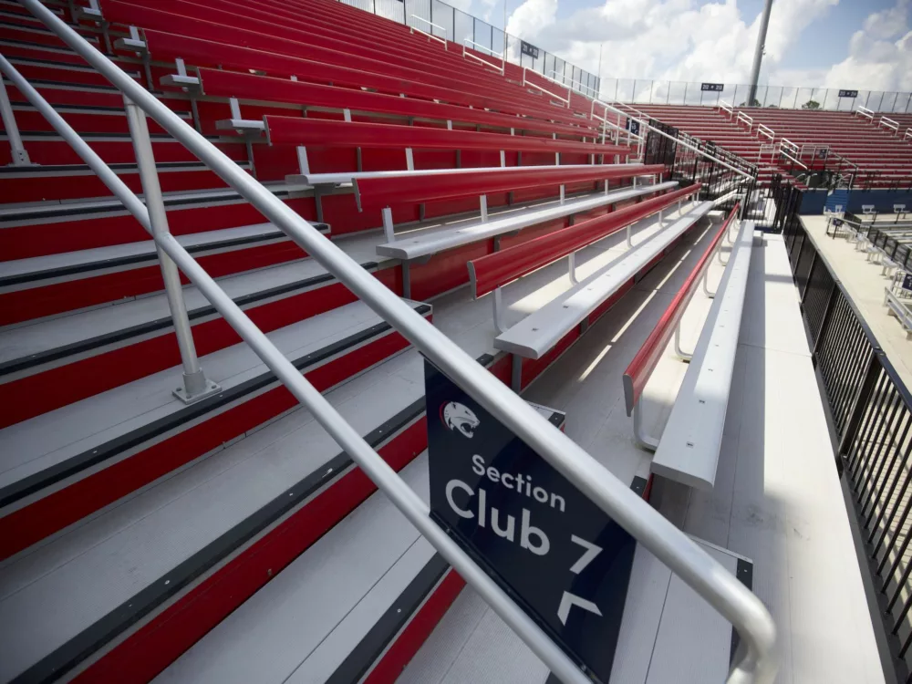 Bleacher bench seating - complete with stadium seats with backs.