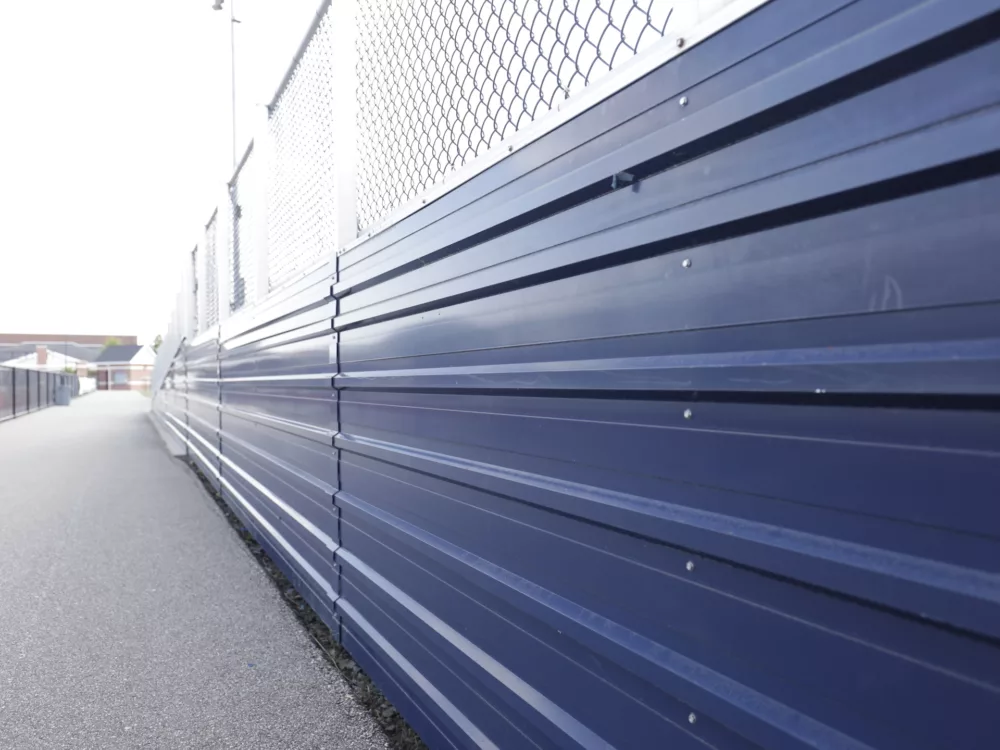 Close-up view of closure panel riser system.