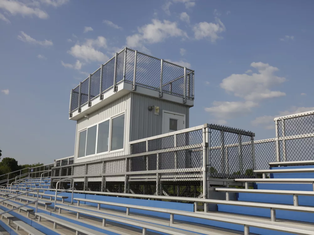 Small press box design with aluminum rail.
