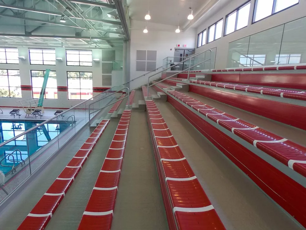 Indoor bleacher seating featured as part of the Dant Clayton hybrid stadium system.