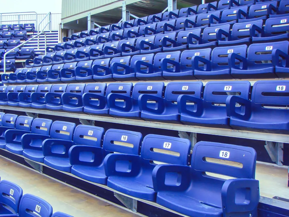 Side view of colosseum-one vented series - stadium seats with backs.
