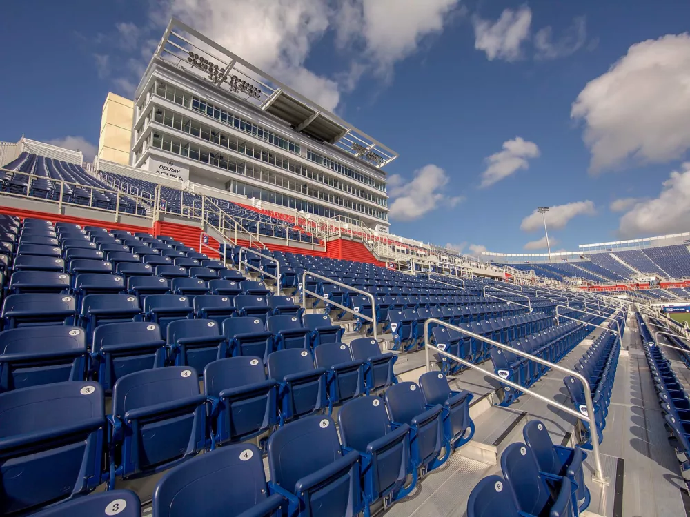 Close-up view of custom bleacher seats at FAU Stadium.