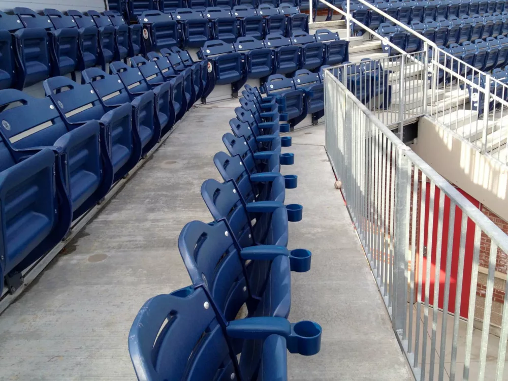 A view of the hybrid stadium system - focusing on the concrete decking system and aluminum rail.