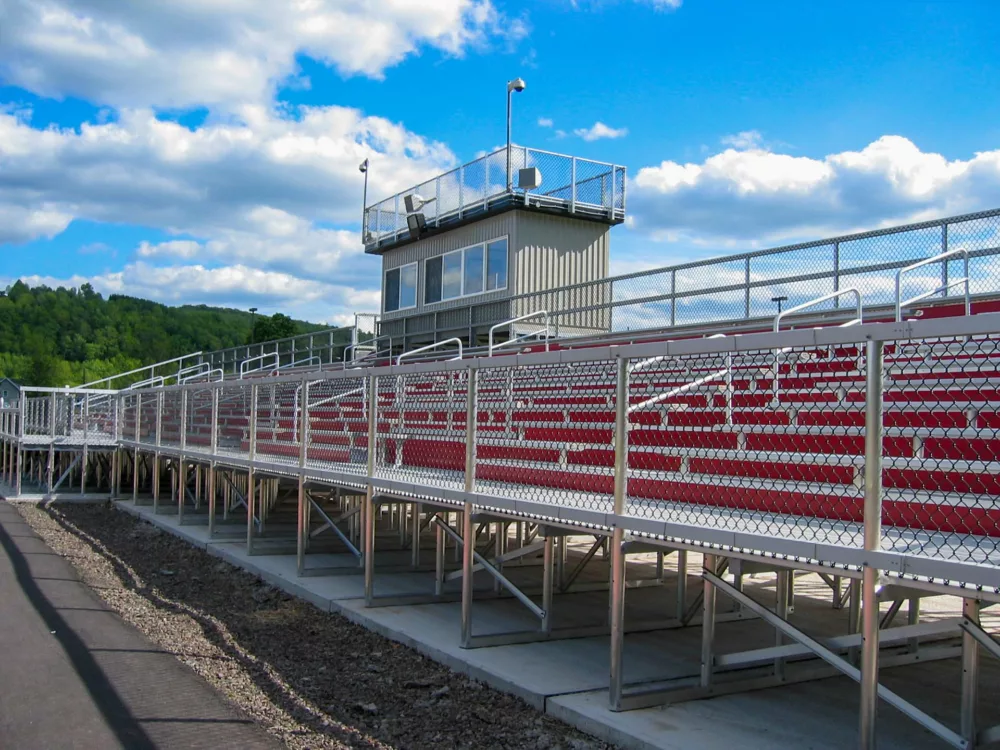 A Dant Clayton project featuring aluminum bleacher seating and a press box.