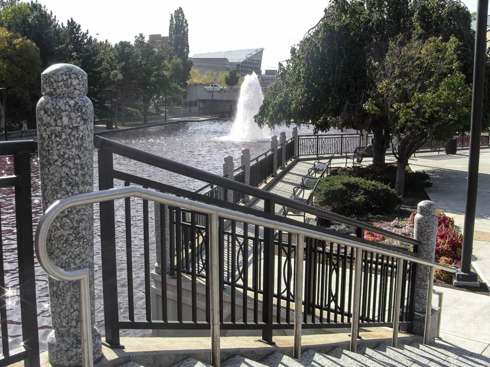 Welded aluminum deck railing with decorative panels.