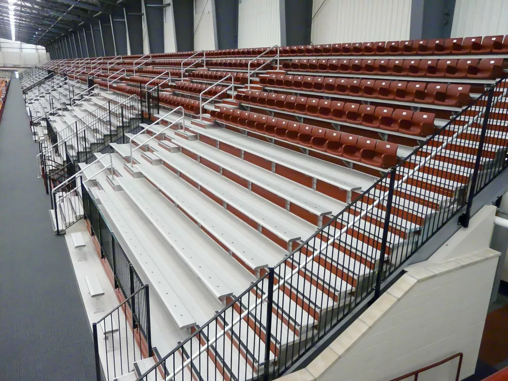I-Beam Grandstand - focused on bleacher seating and aluminum deck railing