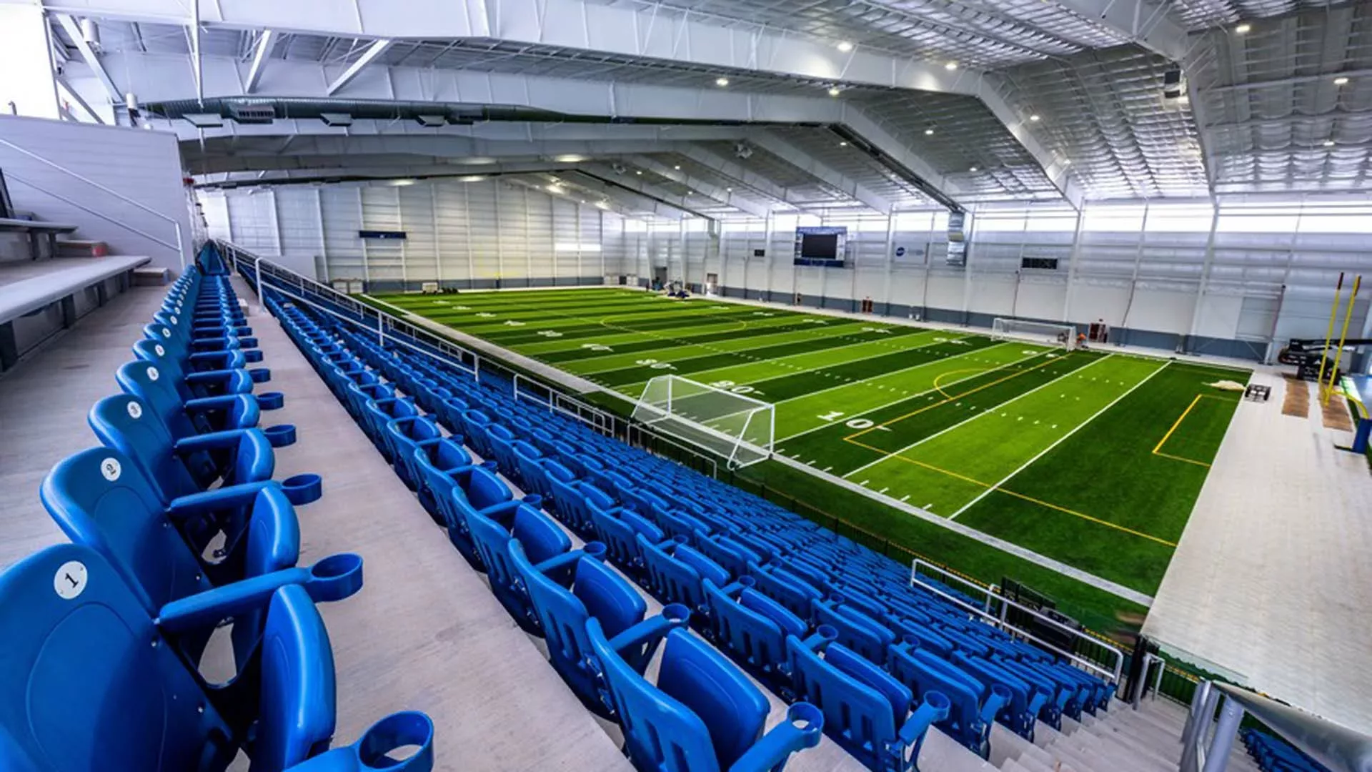 View of custom bleacher seats and aluminum rail housed in Anderson Auto Group Fieldhouse.