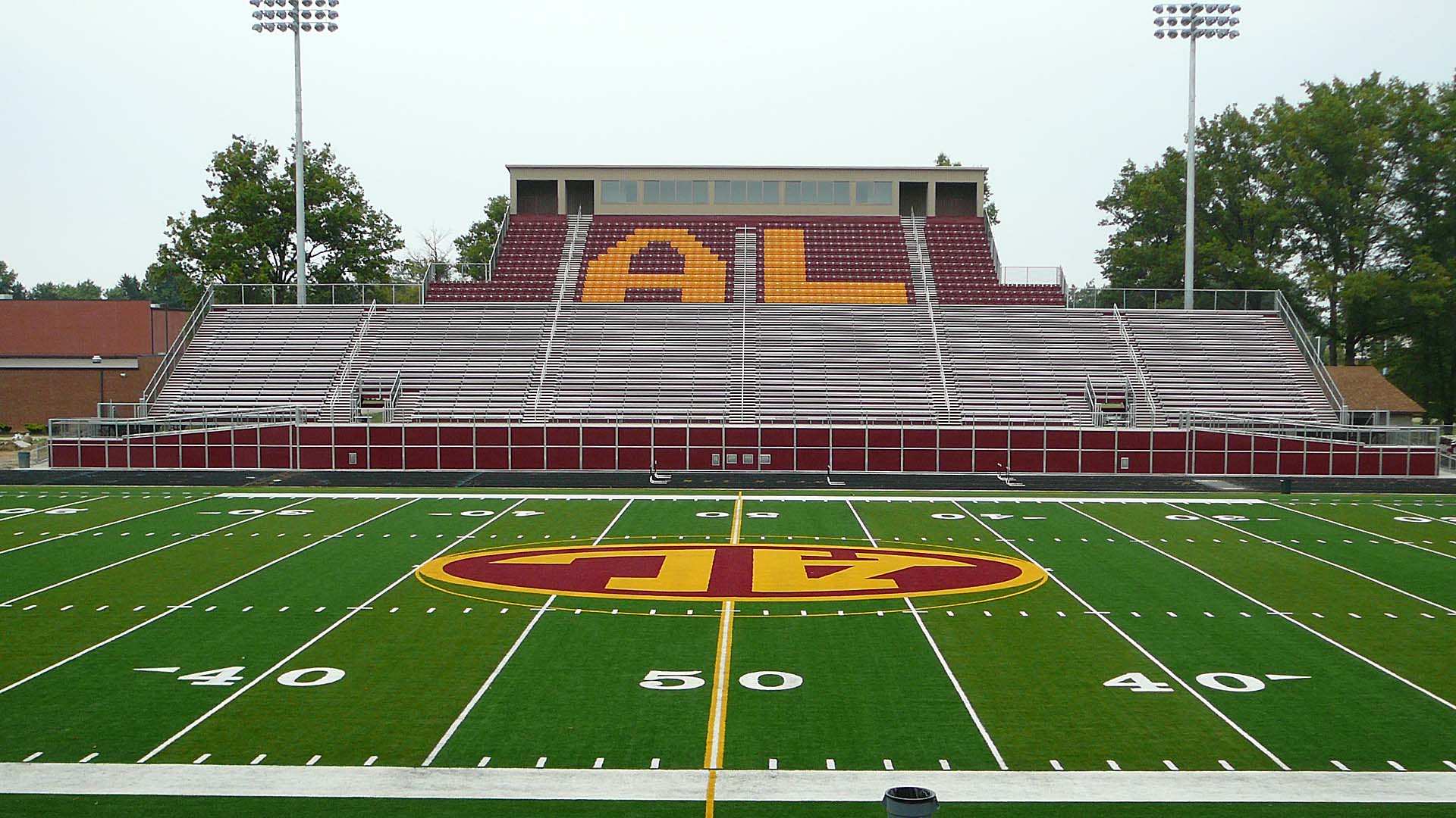 View of grandstand at Avon Lake High School - featuring custom bleacher seats.