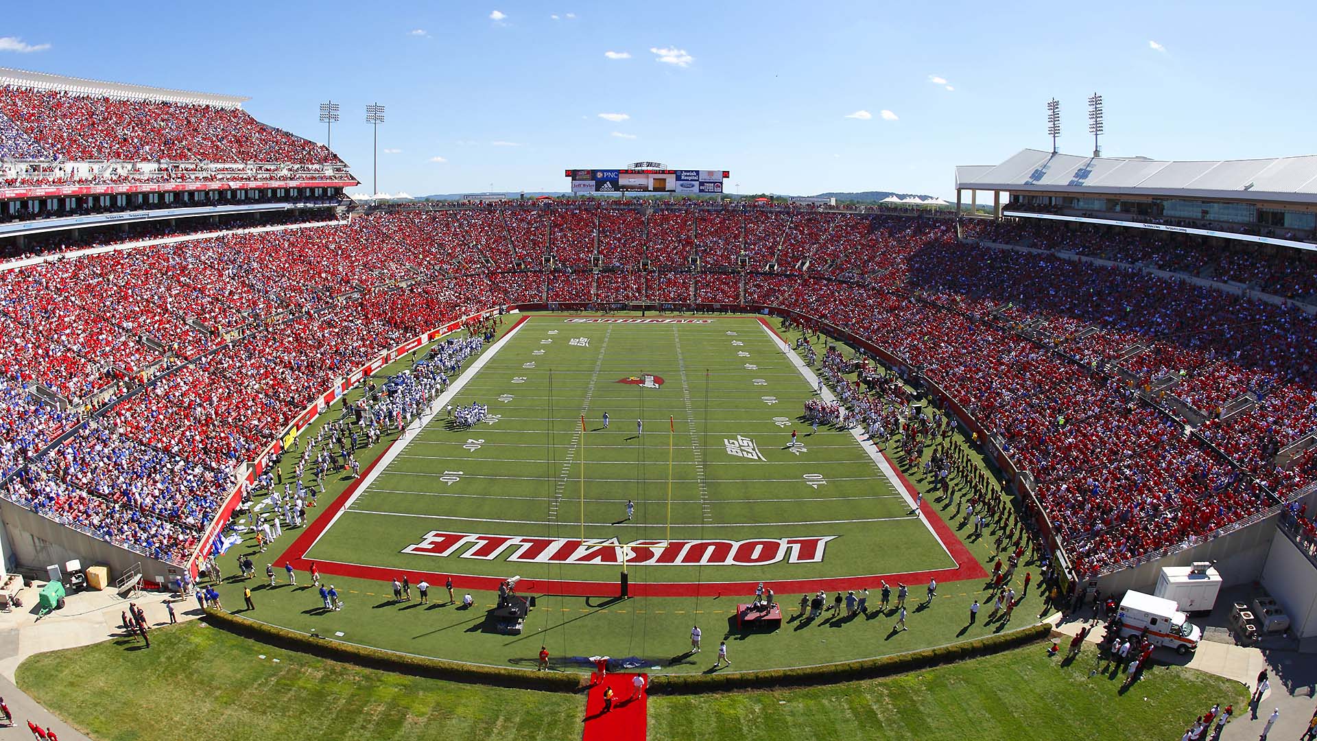 Cardinal Stadium features horseshoe layout grandstand seats.