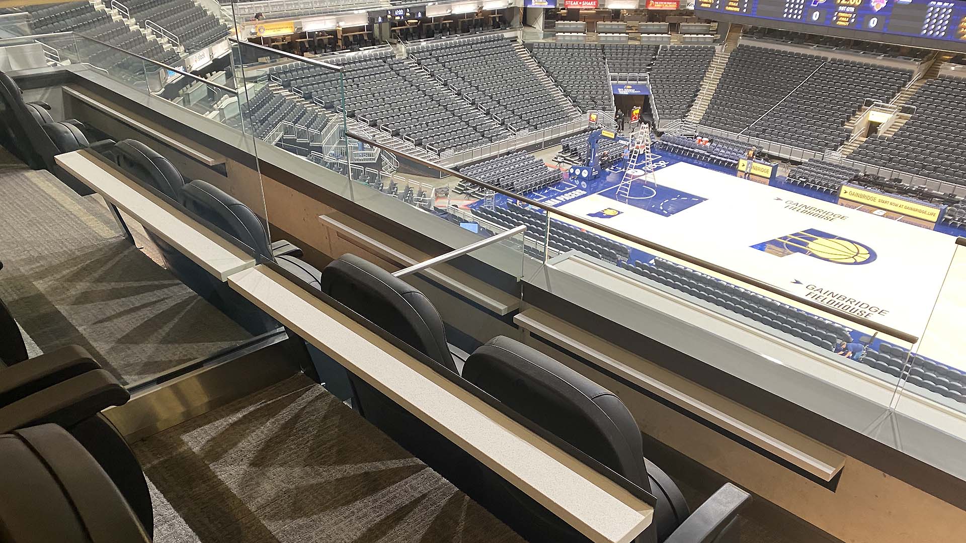Press box view looking over the bleacher seating at Gainbridge Fieldhouse.