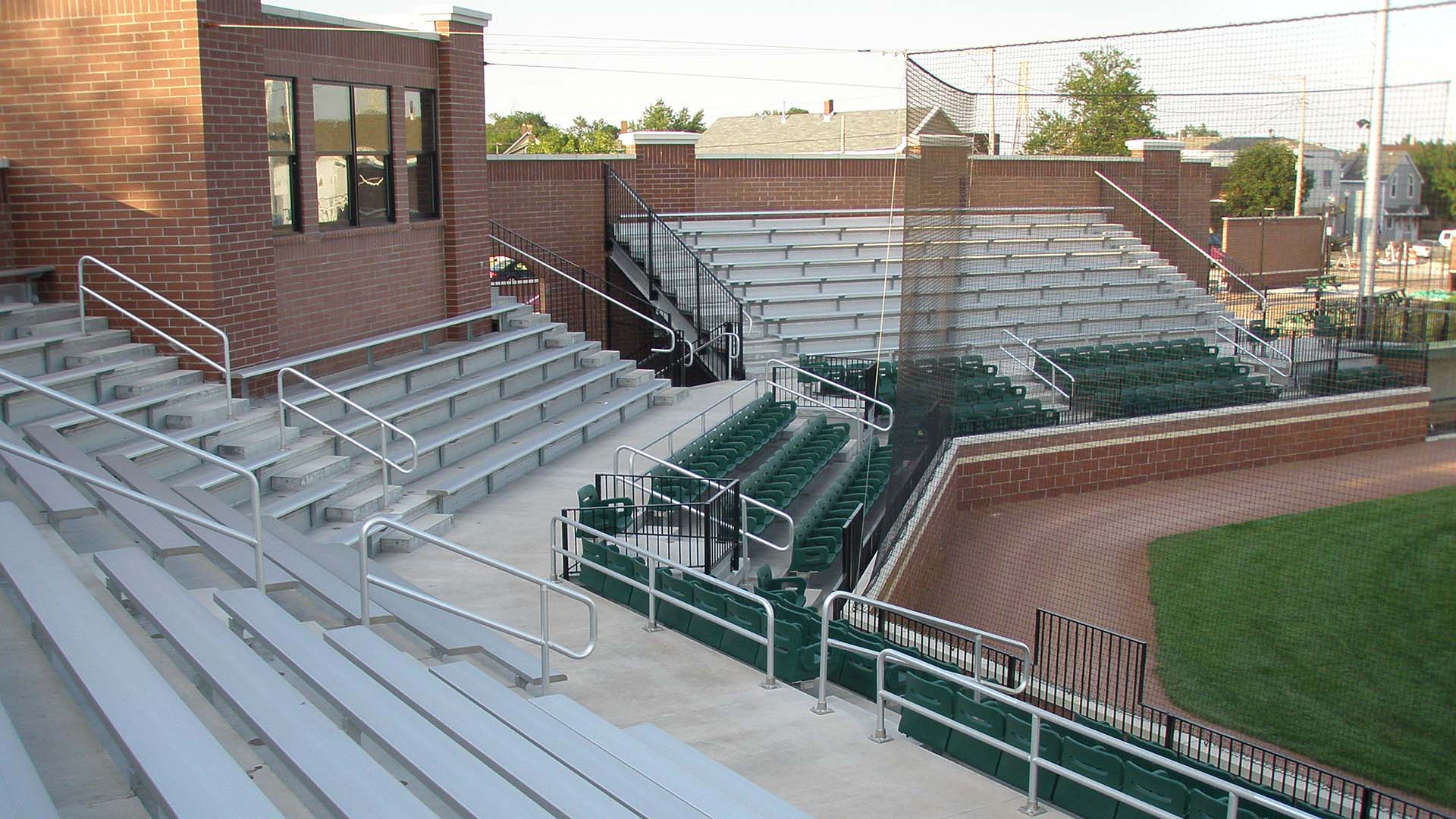 Oil City Stadium consists of custom bleacher seats and a press box attached to the decking system.