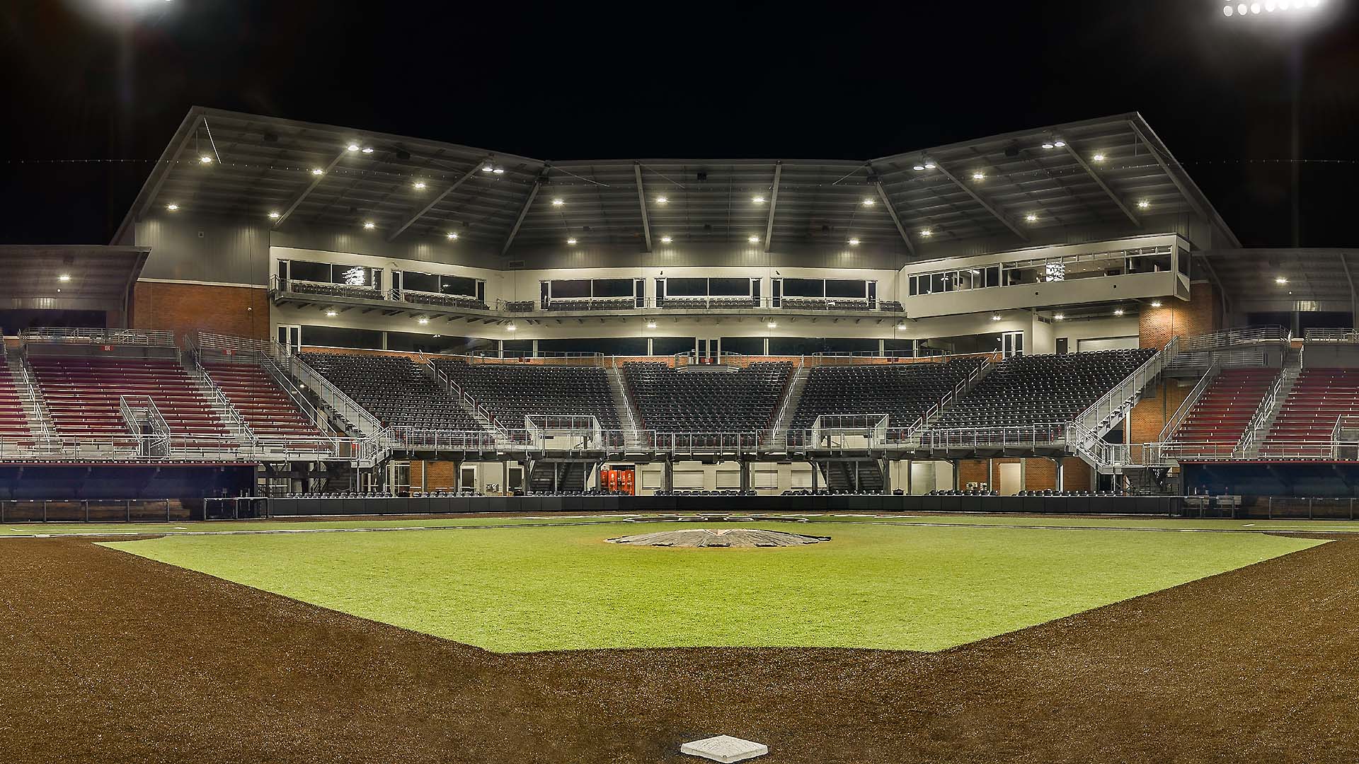 Stadium design for Russo Park combines stadium bleacher seats with a press box.