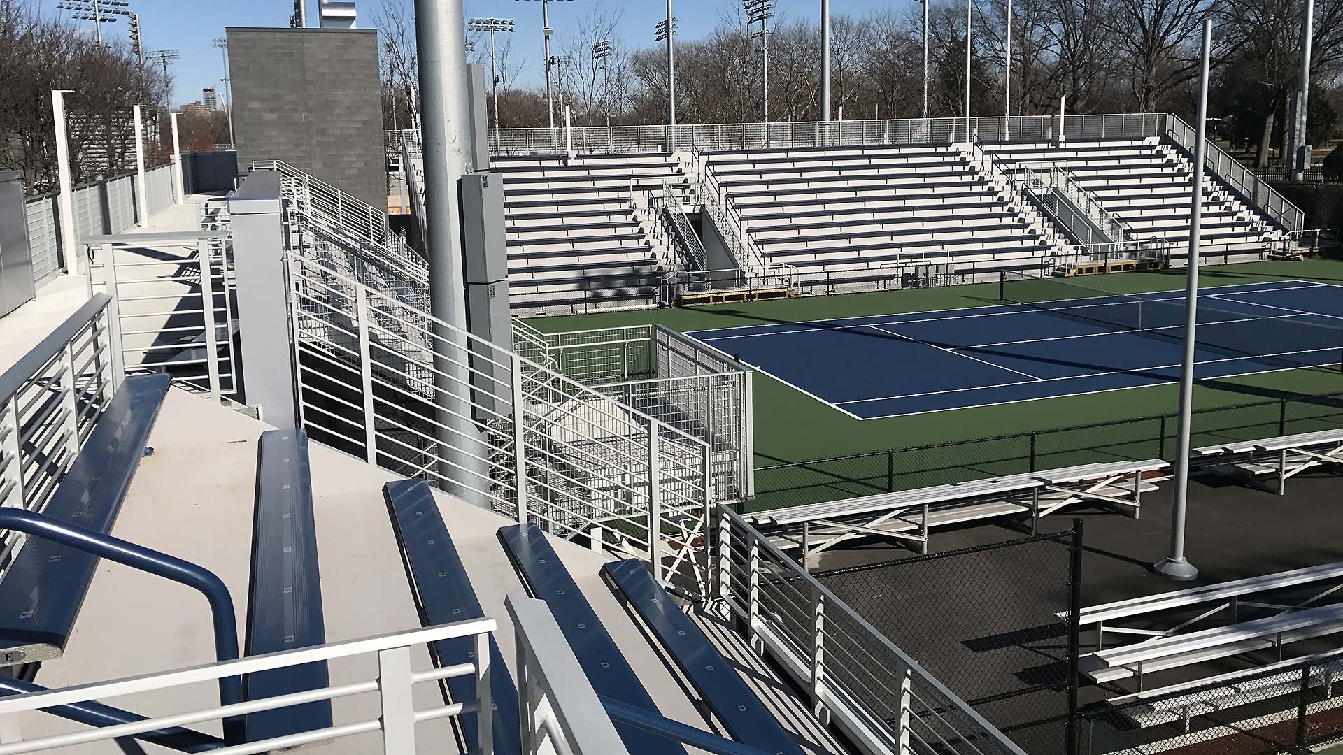 Alternate view of the USTA South Campus grandstands, with more focus on the aluminum rail.