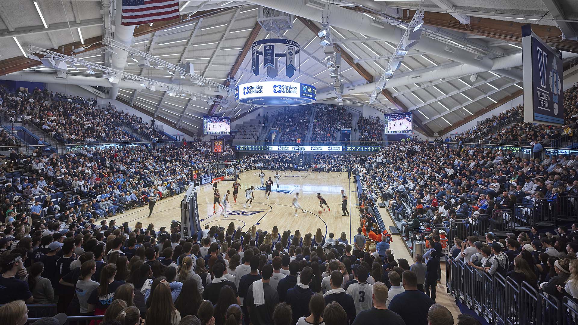 Finneran Pavilion bleacher seats filled with fans attending a game.