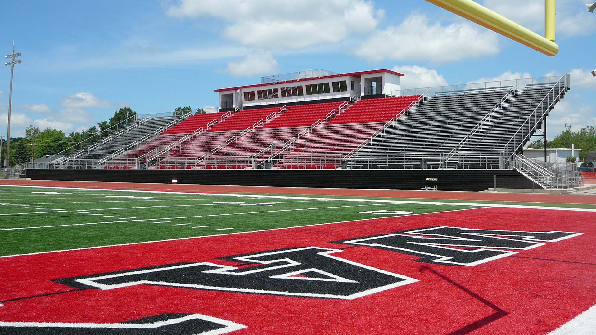 Wayne Hish school grandstand features a large aluminum decking system and aluminum bench seats.